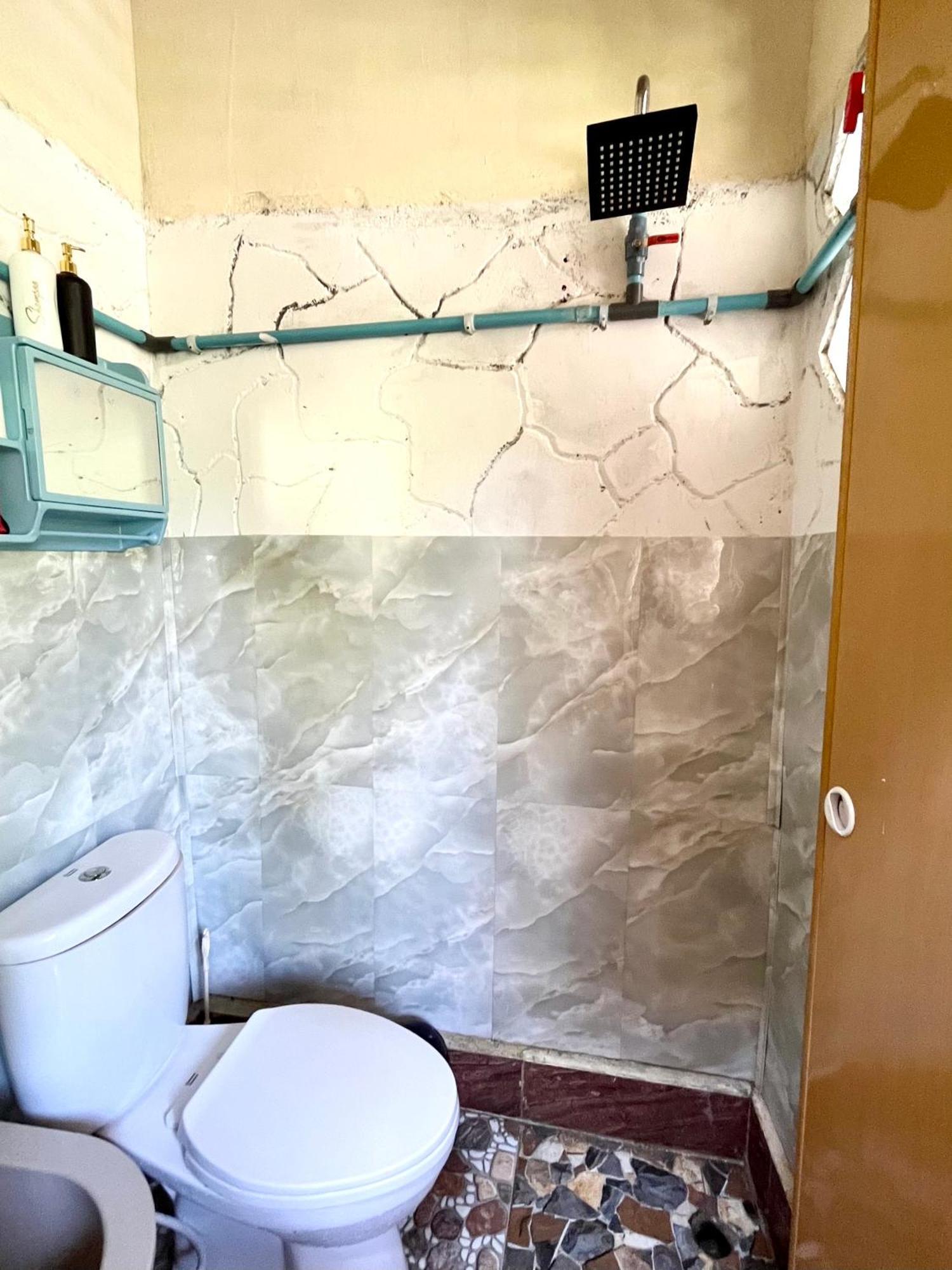 Charlys Little House Otel Bukit Lawang Dış mekan fotoğraf
